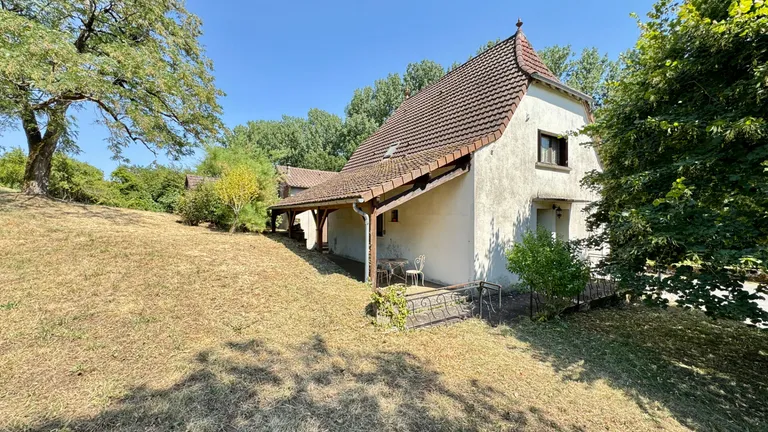 Frontenac, Lot : maison de village et 3 dépendances, terrain de 5 352 m² Photo du bien