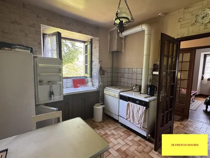 Maison ancienne en pierre et ardoise avec grange aménagée à Affieux — photo 3