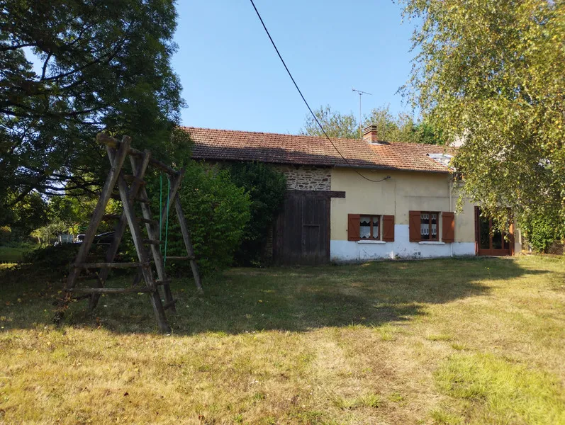 Semi-detached village house with adjoining barn in Mialet photo 2