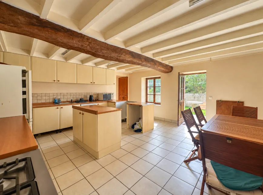 Semi-detached stone country house with garden in Saint-Georges-de-Longuepierre photo 4