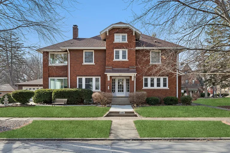 Moline, IL Brick Colonial Revival Home with 3 Bedrooms and Sunrooms property photo