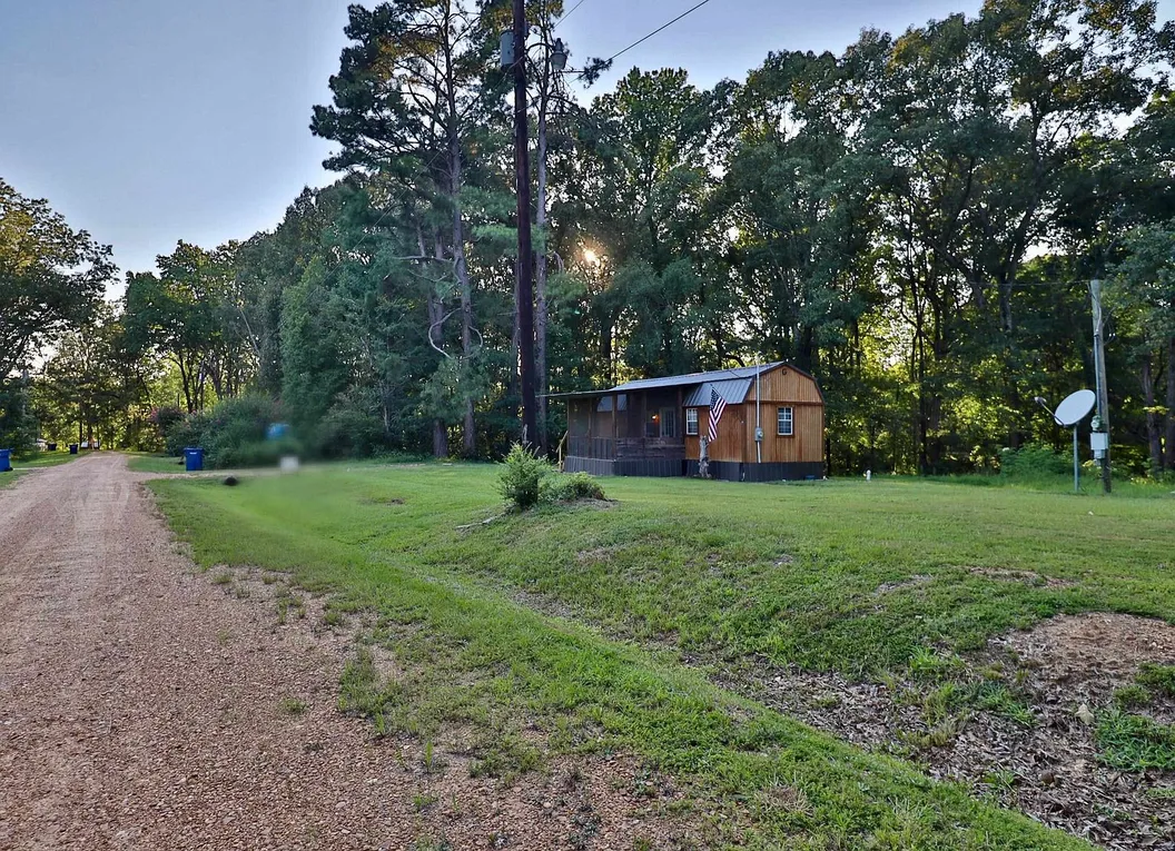Sardis, Mississippi Cabin for Sale with RV Hookup on 0.35 Acres photo 2