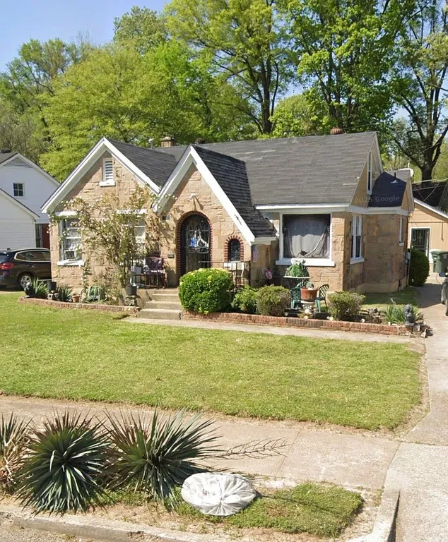 Memphis, TN Stone-and-Wood Home with 3 Bedrooms and Detached 2-Car Garage for Sale property photo