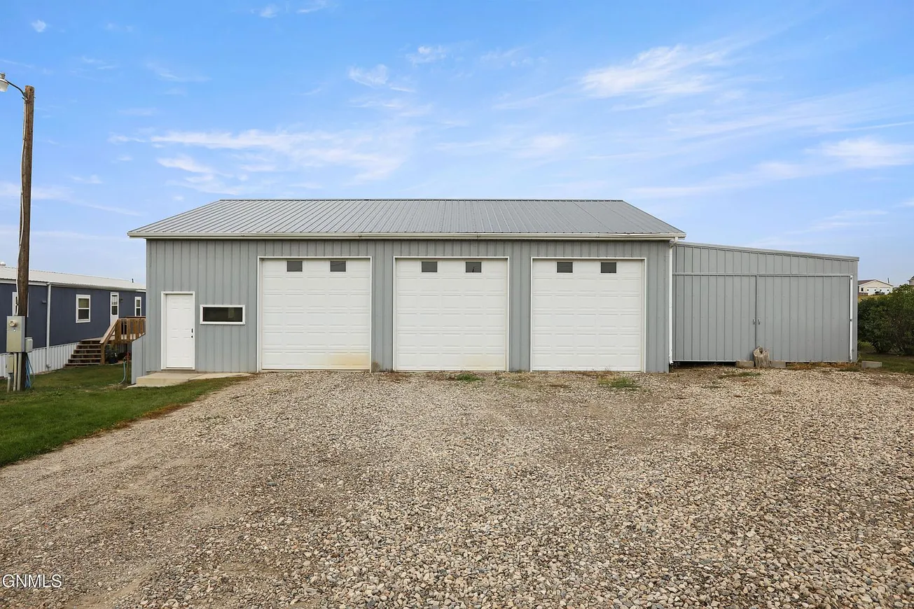 Private Country Oasis with Updated Manufactured Home and Exceptional Shop Space photo 3