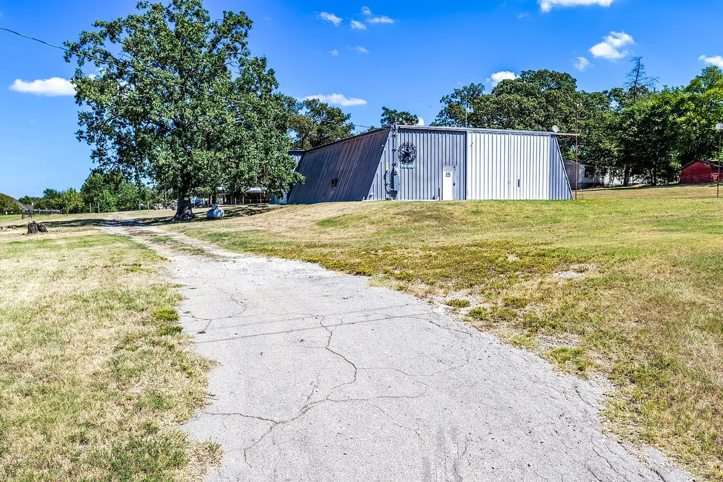 2.77-Acre Country Property with Large Metal Shop in Sulphur Springs, TX photo 2
