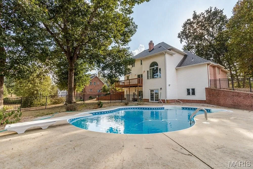 Five-Bedroom Detached Home with Walk-Out Basement and Heated In-Ground Pool photo 2