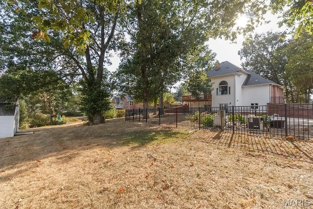 Five-Bedroom Detached Home with Walk-Out Basement and Heated In-Ground Pool photo 7