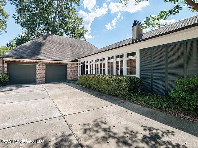 Acadian-Style Home with Private Park-Like Lot in Northeast Jackson photo 3