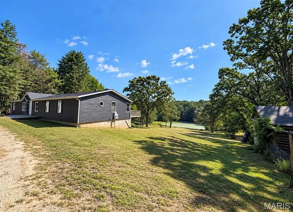 Rural Retreat on 4.76 Acres with Pond in Dittmer photo 2