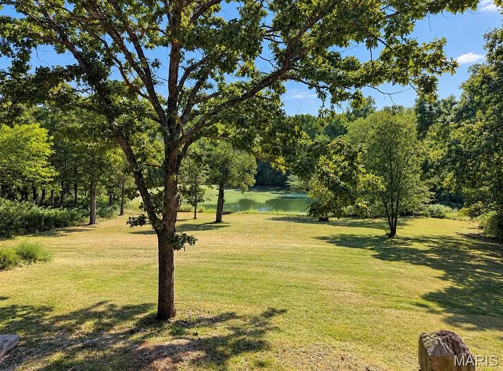 Rural Retreat on 4.76 Acres with Pond in Dittmer photo 3