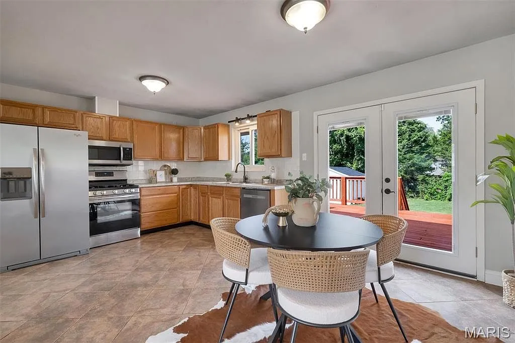 Updated Split-Level Home with 4 Bedrooms and Walkout Lower Level in Saint Louis photo 9